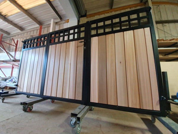 Metal Framed Timber Bi Fold Gates with Square Feature