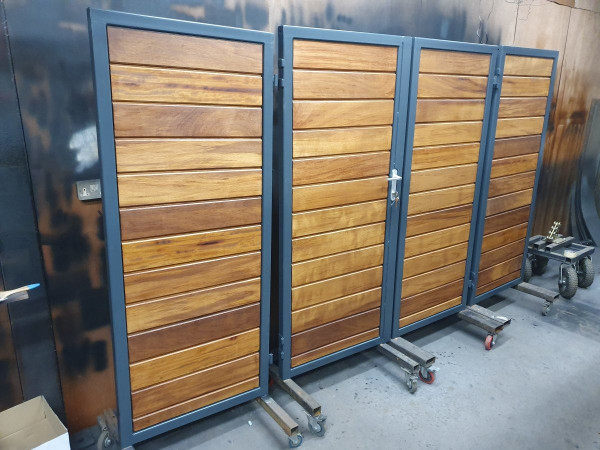 Tall Metal Framed Timber Bi Fold Gates