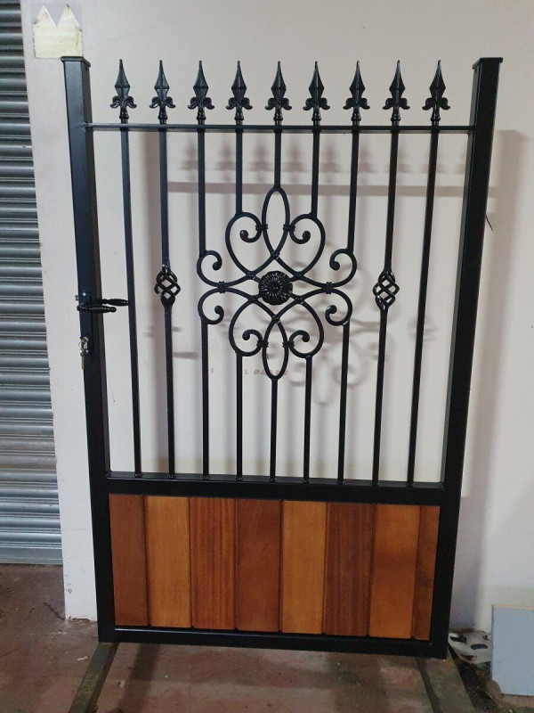Tall Metal Framed Half Timber Garden Gate with Ornamental Feature with Railheads