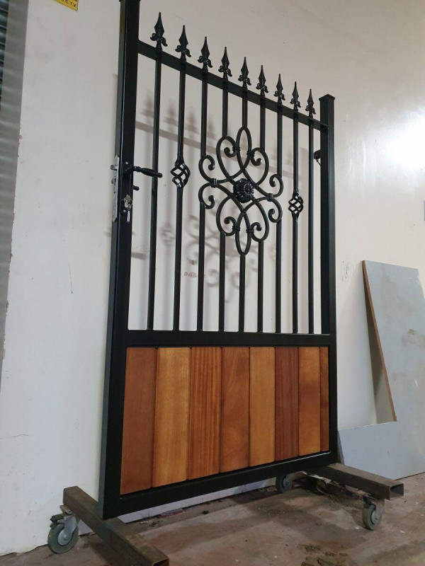 Tall Metal Framed Half Timber Garden Gate with Ornamental Feature with Railheads