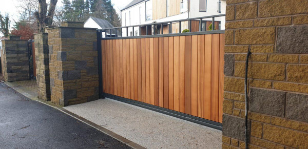 Tall Metal Framed Timber Sliding Gates with Square Feature