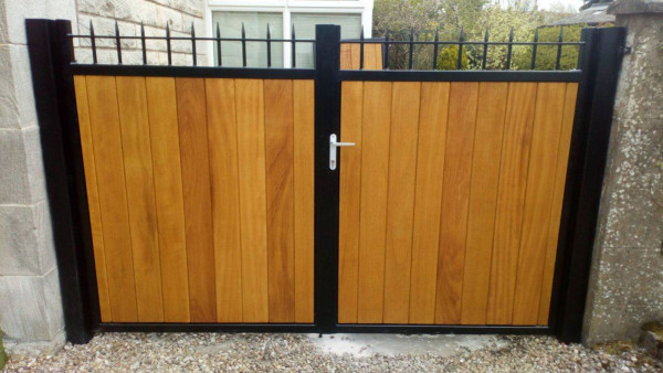 Tall Metal Framed Timber Iroko Driveway Gates with Railheads