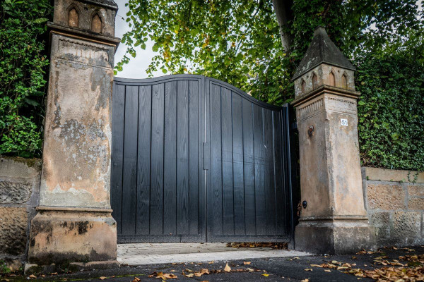 Tall Metal Framed Black Timber Driveway Gates