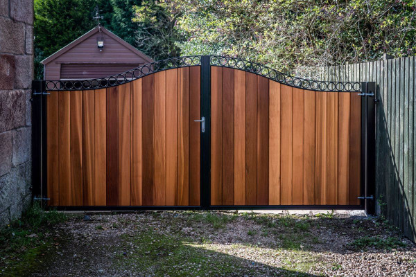 Metal Framed Timber Gates with Circle Feature